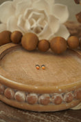 Load image into Gallery viewer, Mini Orange Spiney Studs
